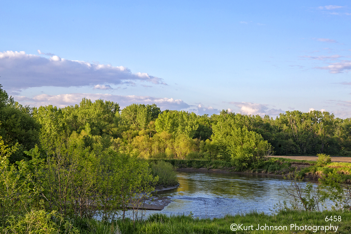 landscape water river grasses trees clouds sunset