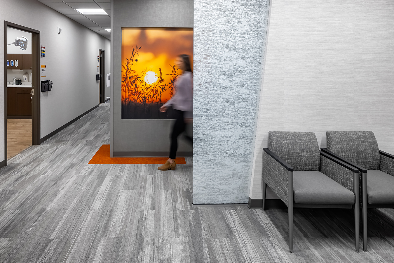 Fairview health services river falls WI Wisconsin BDH Koroseal large scale wallcovering graphic mural orange grass grasses sunset sunrise landscape hall hallway corridor